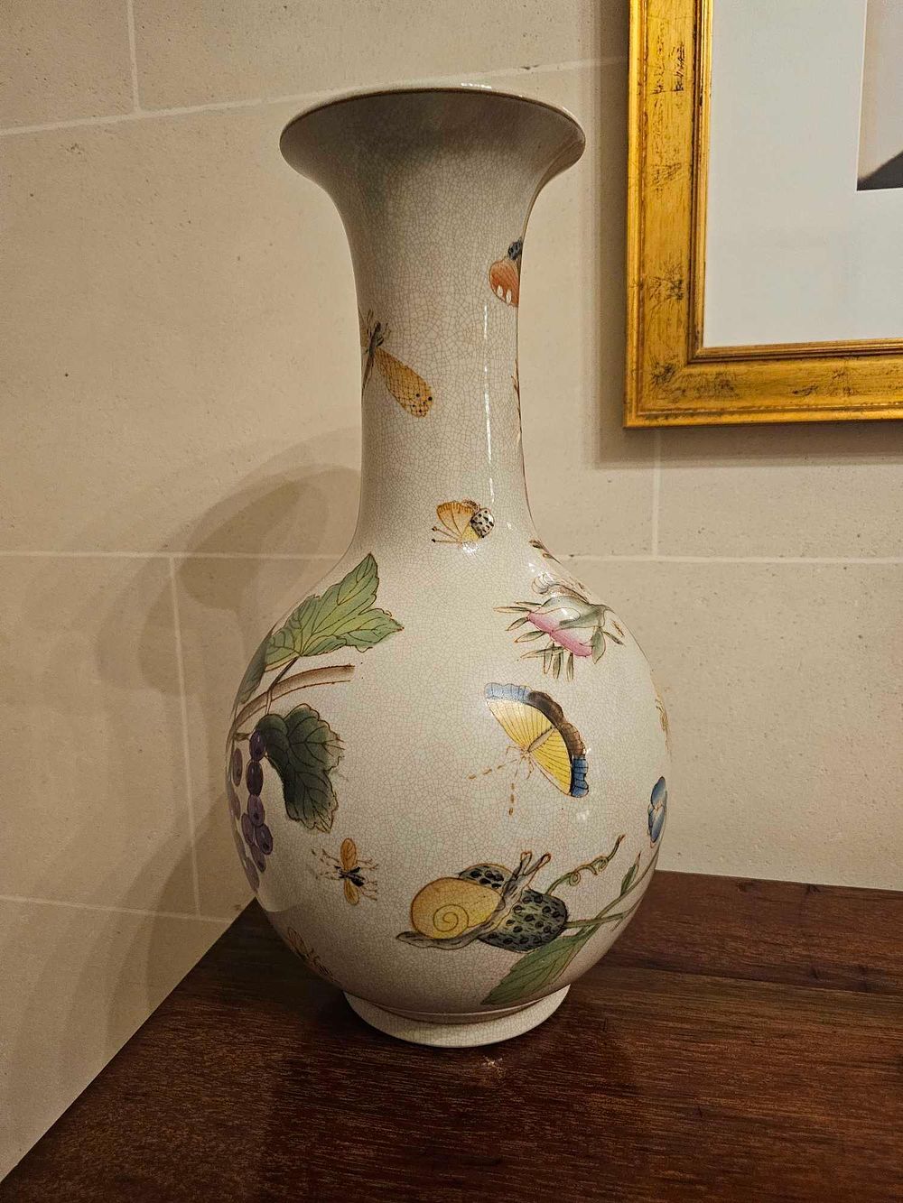 Lot 94: A Chinese Famille-Rose 'Insect and Botanical' Bottle Vase, Qing Dynasty, Qianlong Period