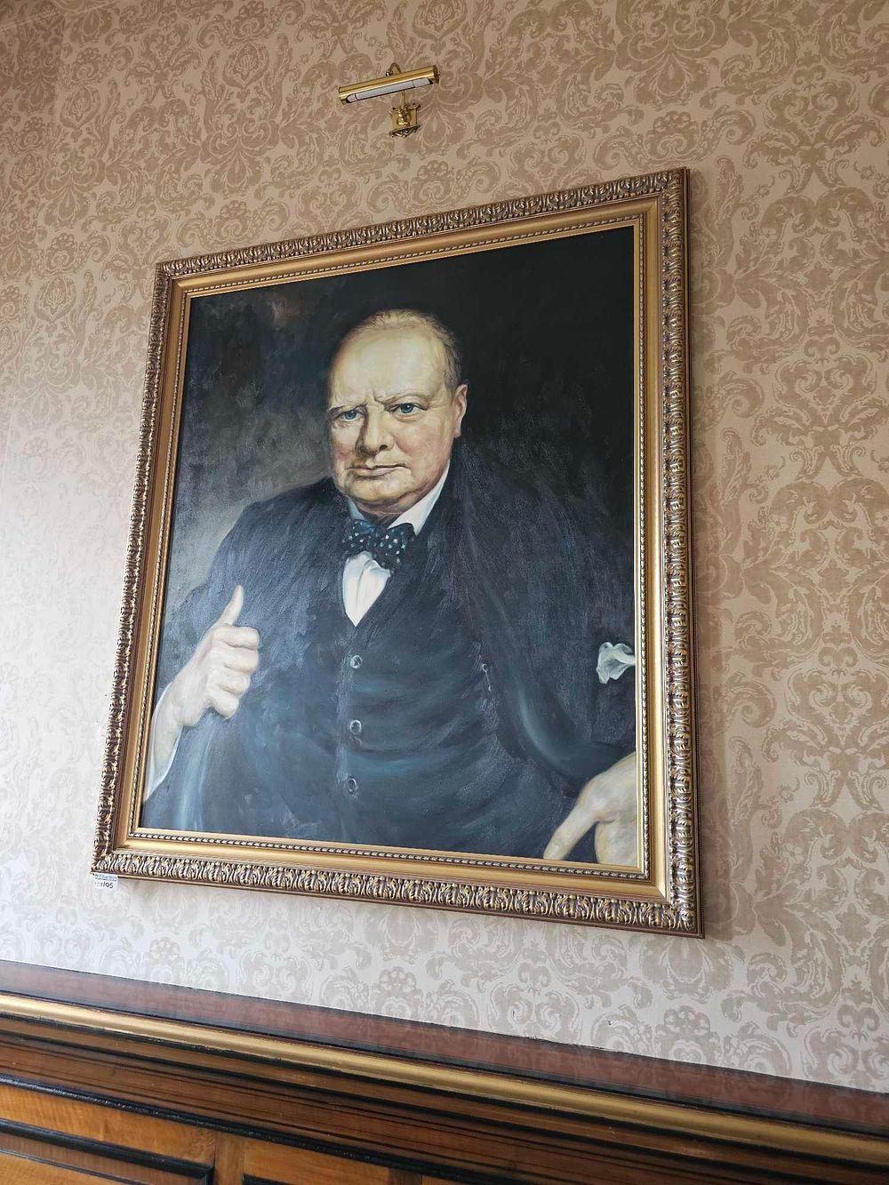 Lot 105: An Oil on Canvas Portrait of Winston Churchill in a Gilded Frame