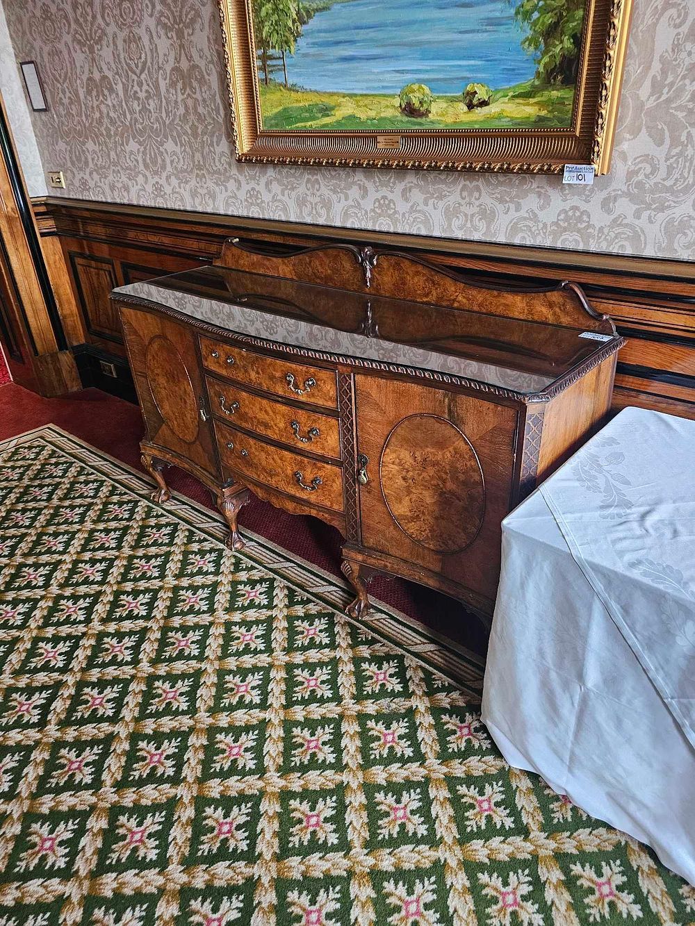 Lot 107: A Late 19th/Early 20th Century Chippendale Style Burl Walnut Sideboard