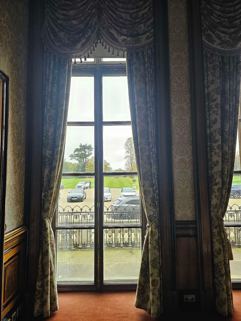 Lot 110: A Set of Decorative Window Drapery, comprising a pair of curtains, swags, tails, and pelmet, in a Late 19th/Early 20th Century Style