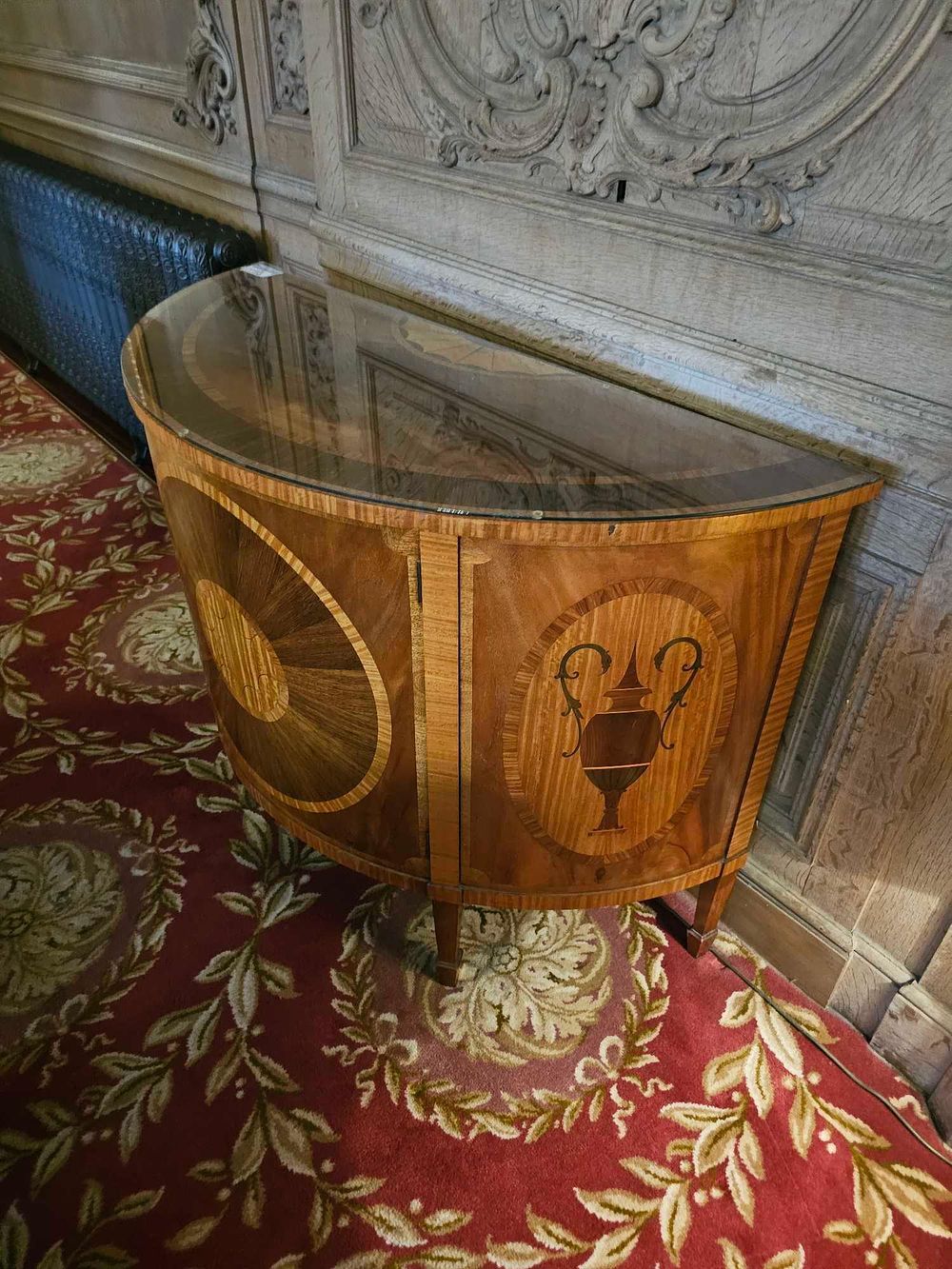 Lot 113: A George III Style Satinwood and Mahogany Demilune Cabinet, attributed to Baker Furniture