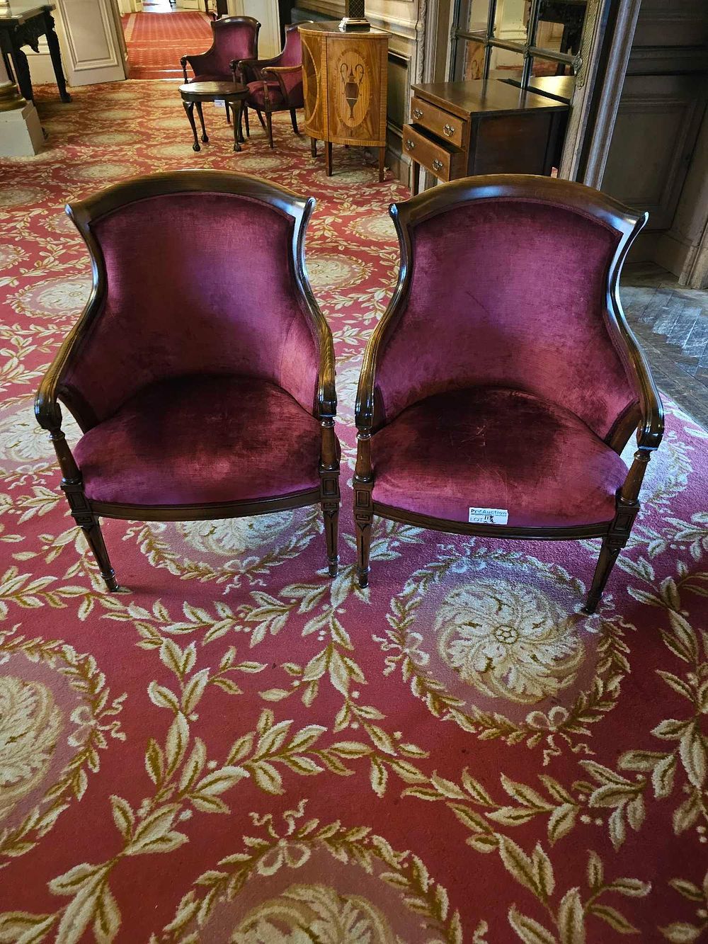 Lot 118: A Pair of Victorian Neoclassical Style Carved Mahogany Gondola Armchairs