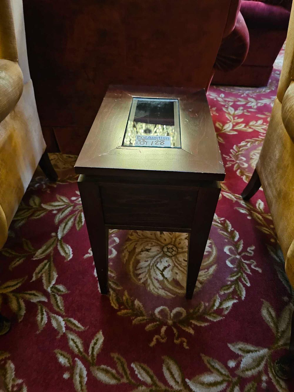 Lot 128: A Contemporary Style Dark-Stained Wood End Table with Recessed Glass Panel
