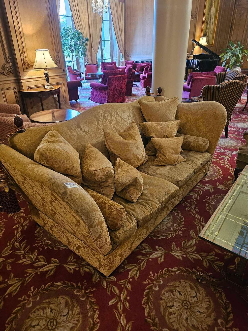 Lot 143: A Large Traditional Style Upholstered Sofa with Turned Wood Finials
