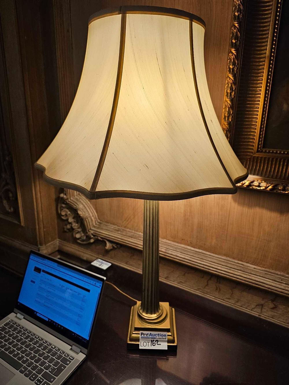 Lot 162: A Neoclassical Style Brass Columnar Table Lamp