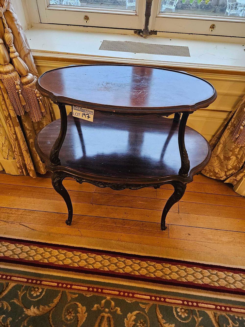Lot 197: A Rococo Revival Style Mahogany Two-Tier Occasional Table