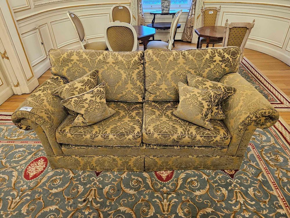 Lot 198: A Neo-classical Style Upholstered Two-Seater Sofa with Rolled Arms