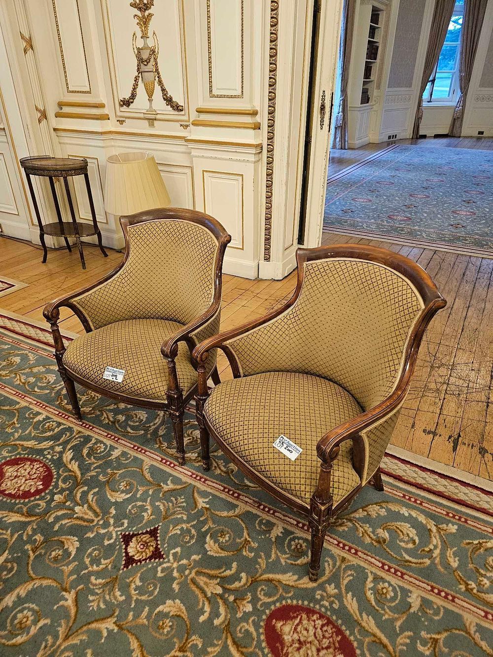 Lot 200: A Pair of Empire Style Armchairs