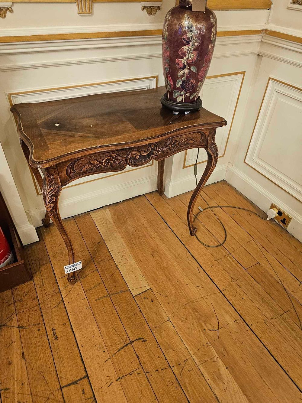 Lot 203: French Louis XV Style Carved Walnut Side Table with Floral Apron
