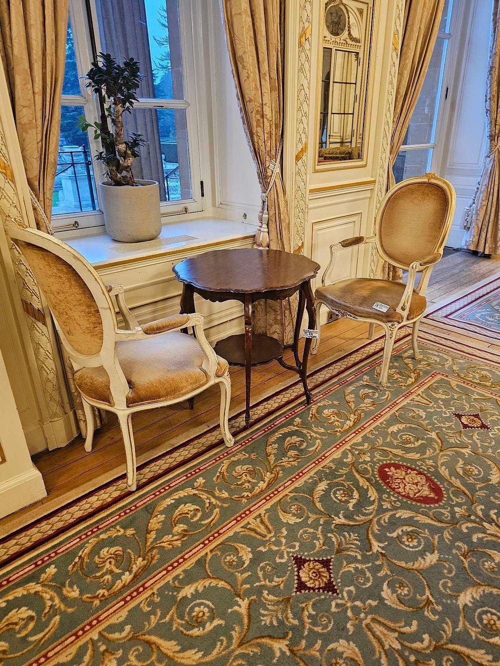 Lot 211: A Pair of Louis XV-Style Armchairs and an Edwardian Mahogany Two-Tier Occasional Table