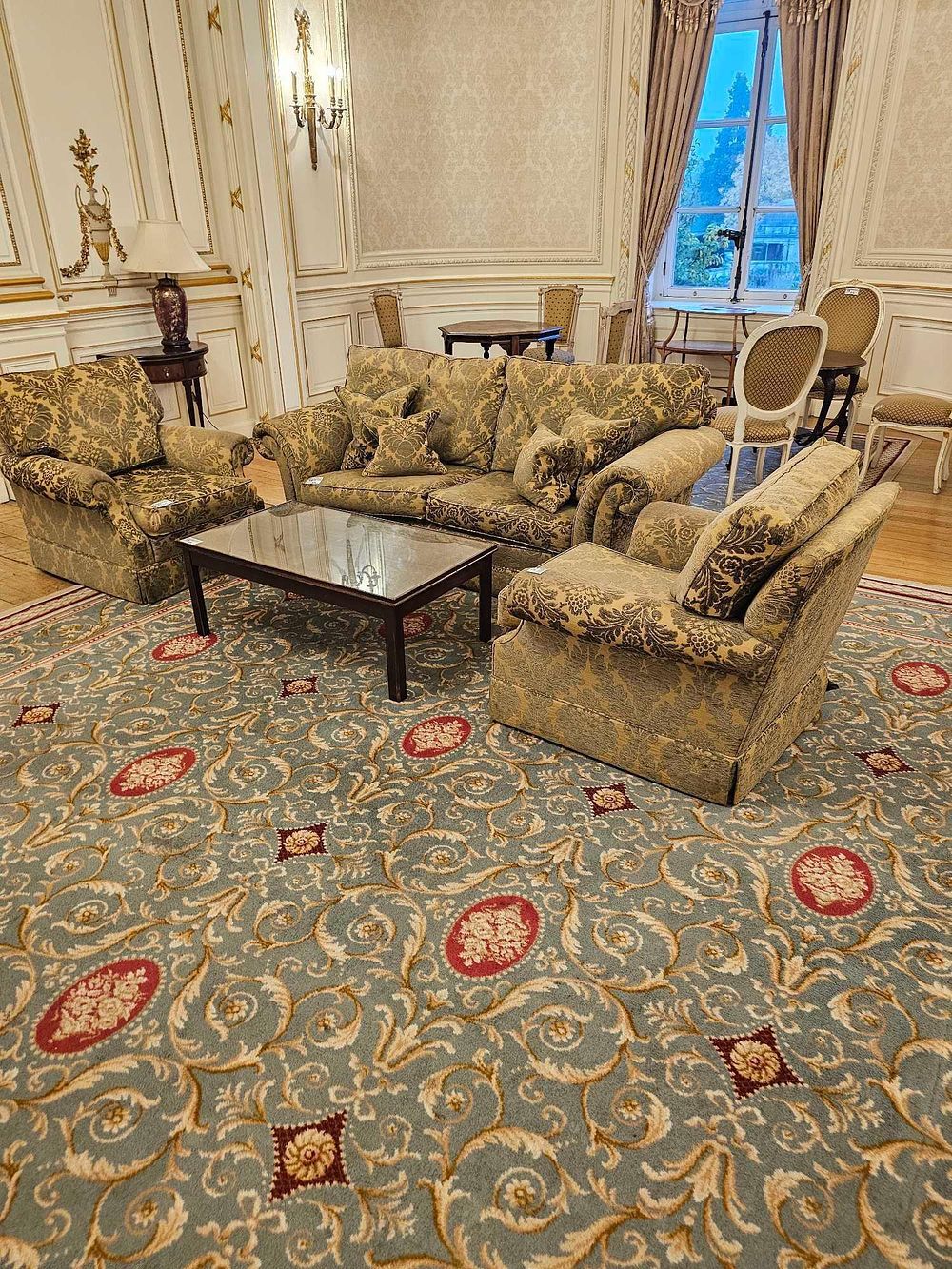 Lot 212: A Traditional Revival Three-Piece Upholstered Living Room Suite and Coffee Table