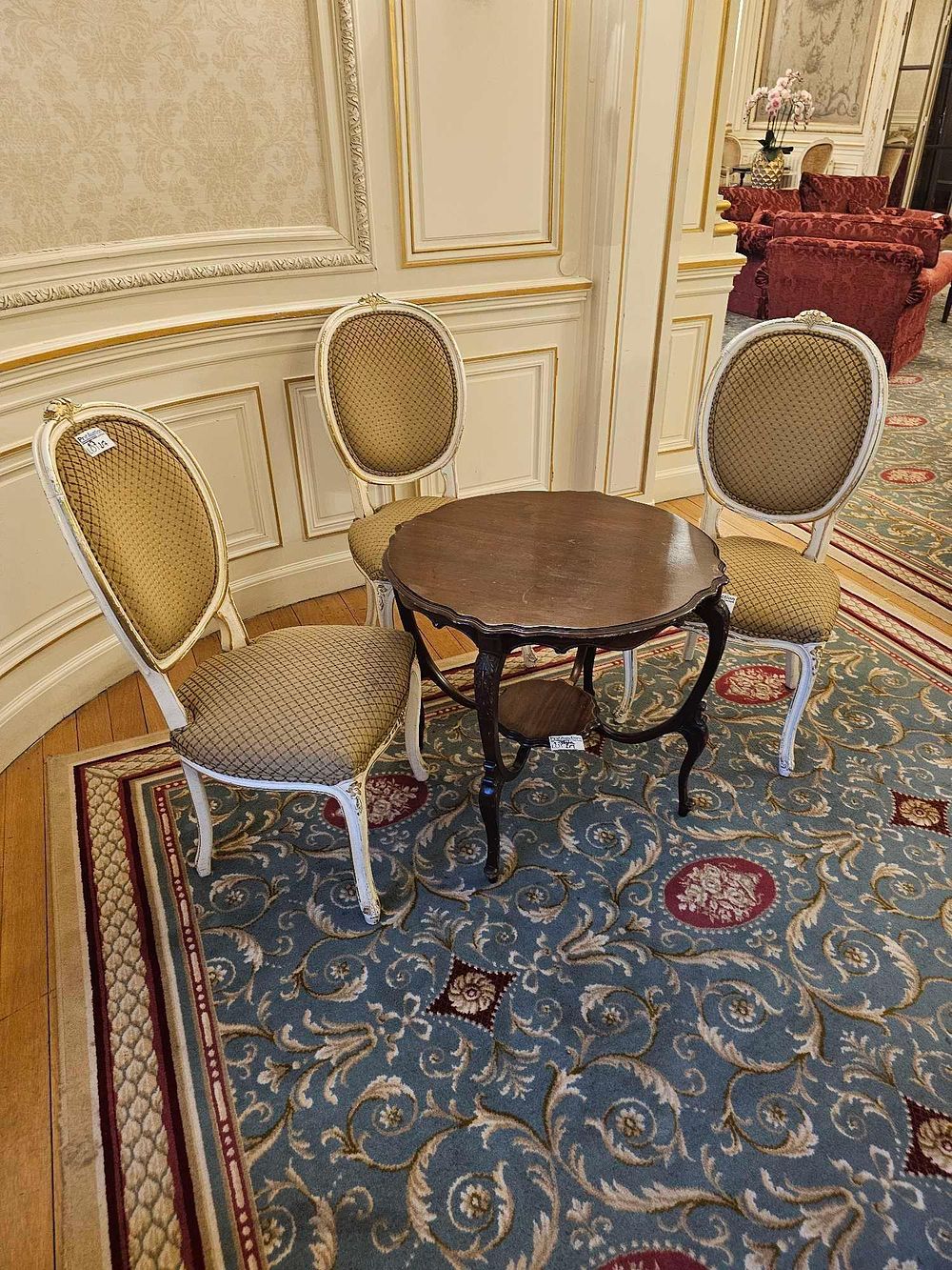 Lot 217: A Louis XV Style Mahogany Occasional Table and Three Matching Chairs