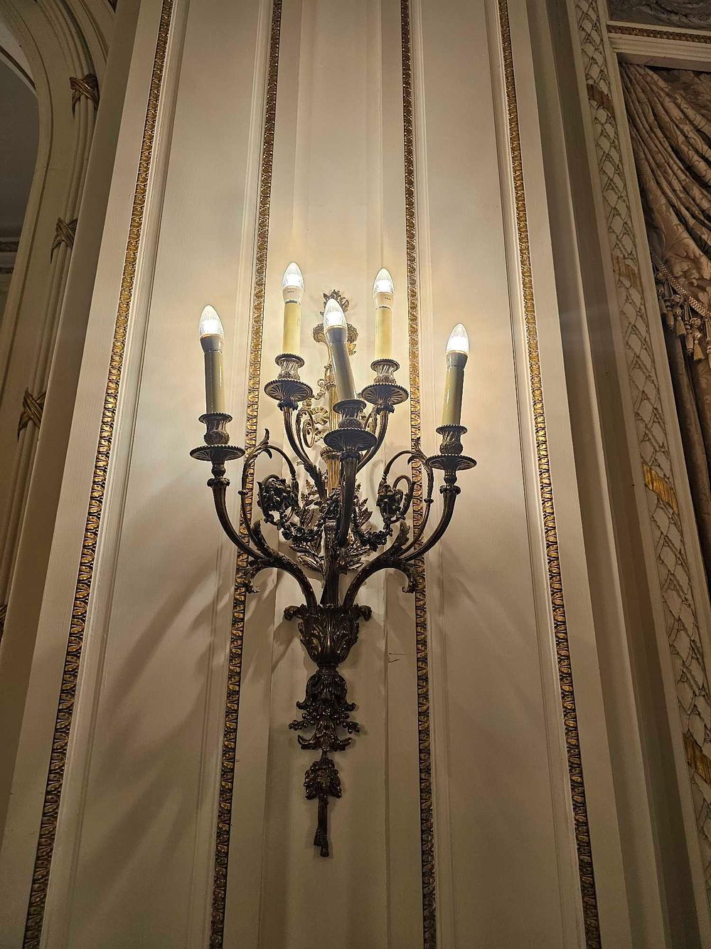 Lot 222: A French Napoleon III Style Patinated Bronze Five-Arm Wall Sconce