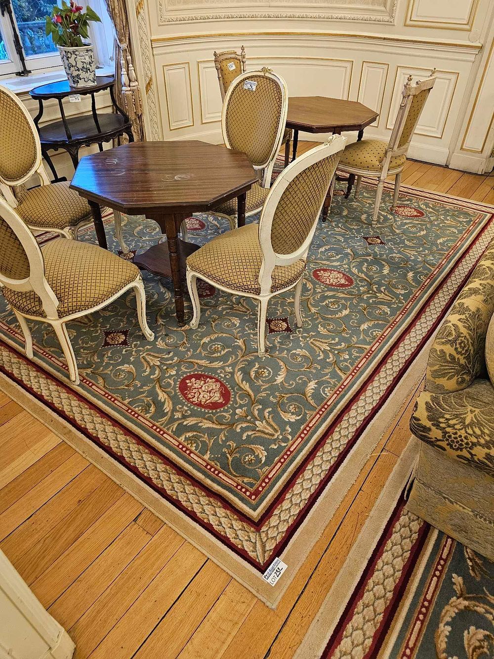 Lot 232: A Large Traditional Style Wool Area Rug