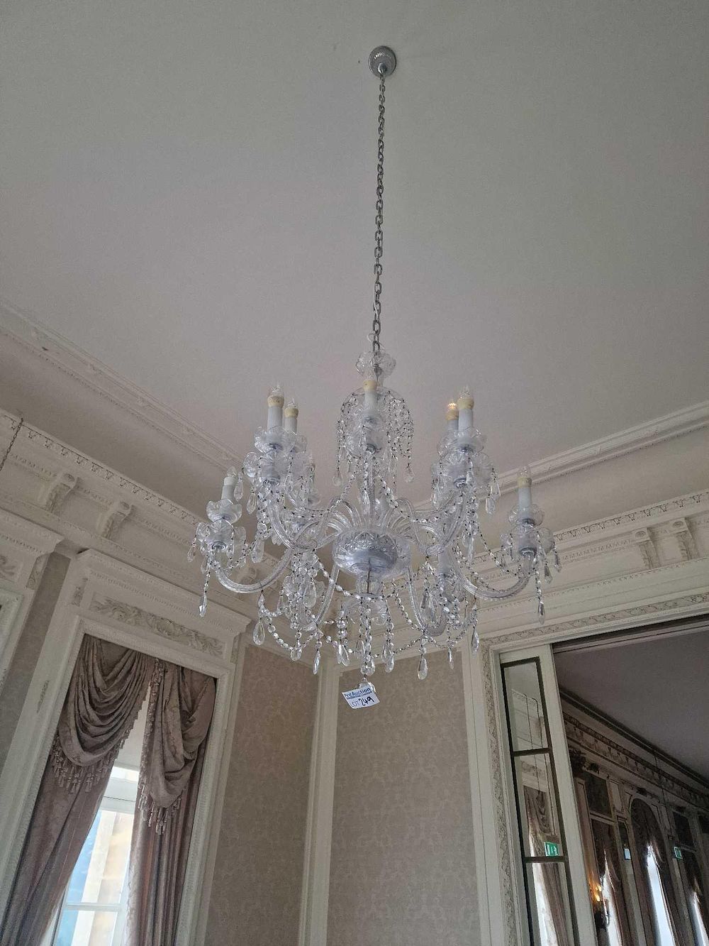 Lot 249: A Traditional Eight-Light Crystal Chandelier