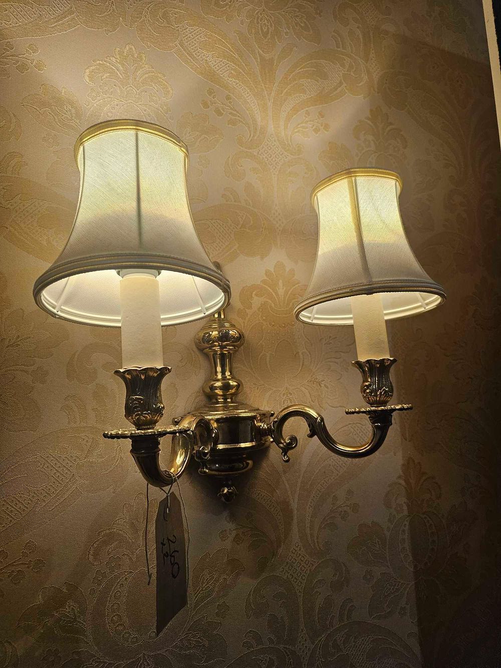 Lot 260: A Traditional Two-Light Brass-Toned Wall Sconce