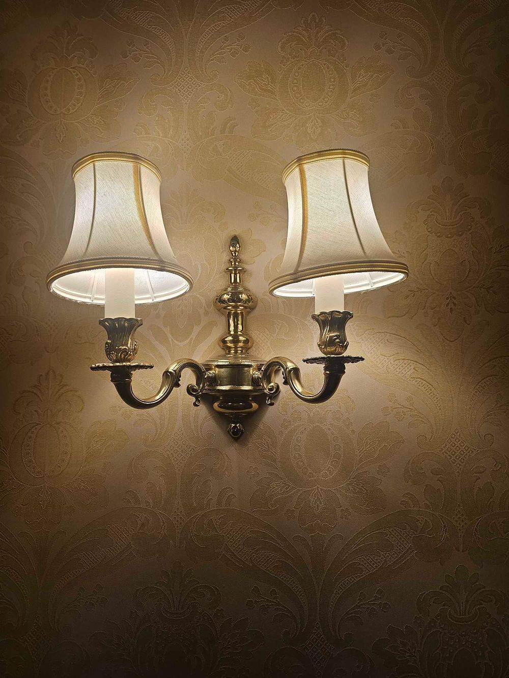 Lot 285: A 1920s Colonial Revival Double-Arm Brass Wall Sconce