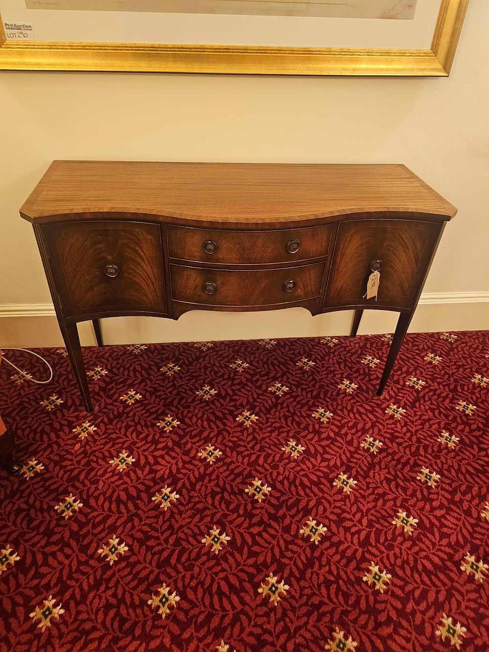 Lot 292: A Late 18th/Early 19th Century Federal or Sheraton Style Serpentine Front Mahogany Sideboard