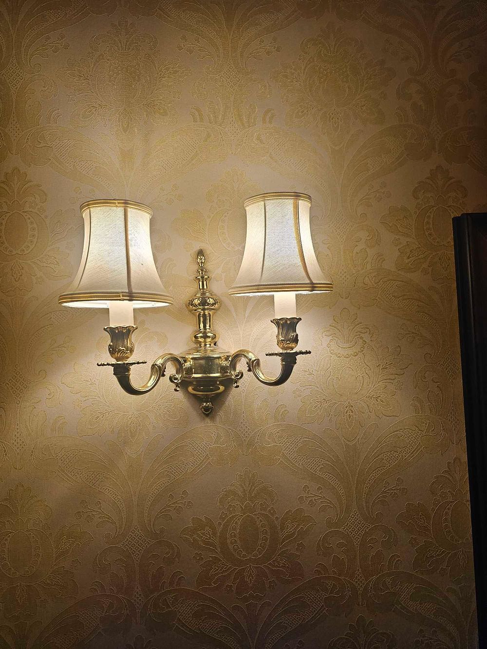 Lot 308: A Colonial Revival Twin-Arm Brass Wall Sconce