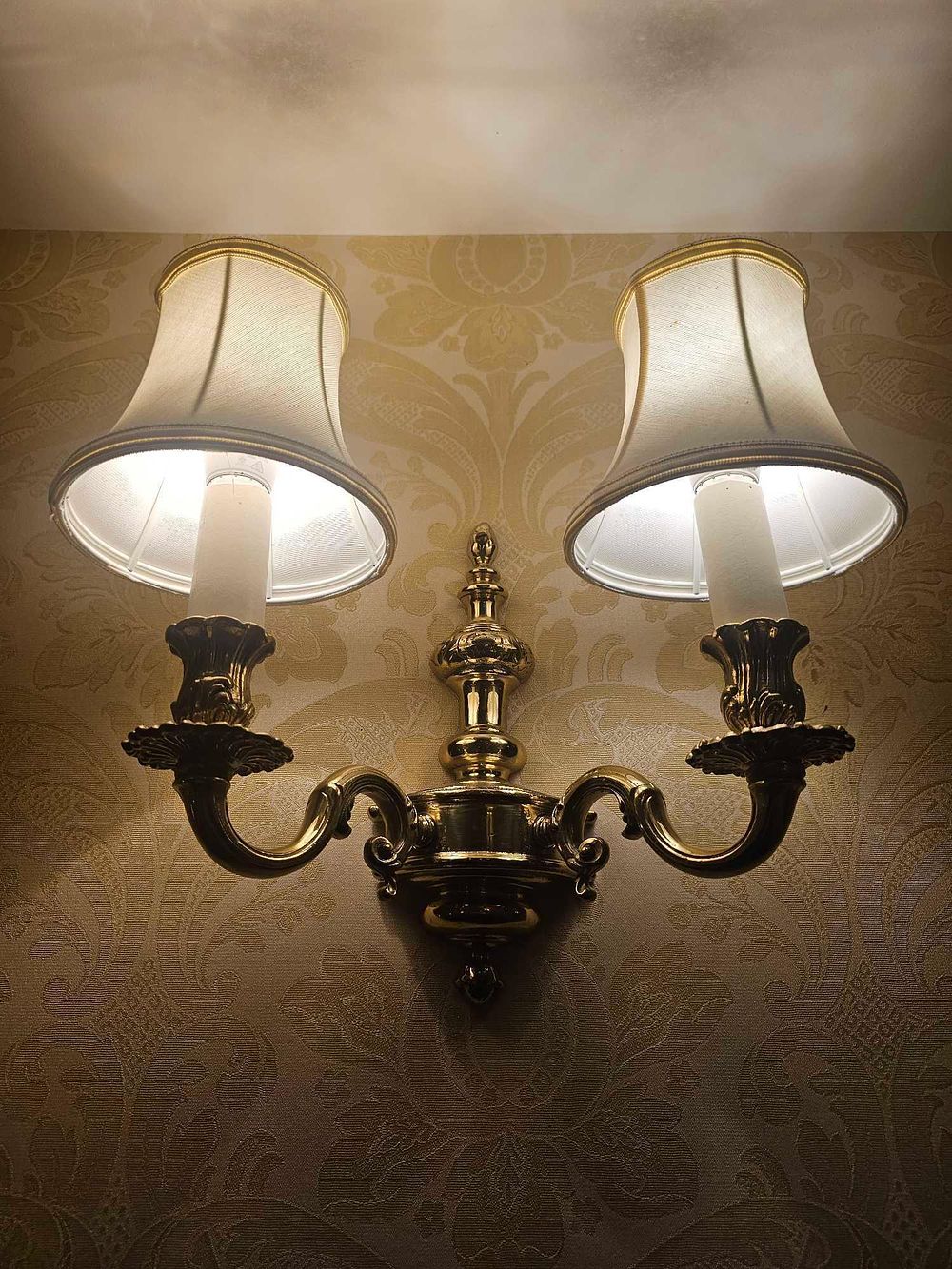 Lot 333: A Brass Two-Light Wall Sconce, in the Classical Revival Style