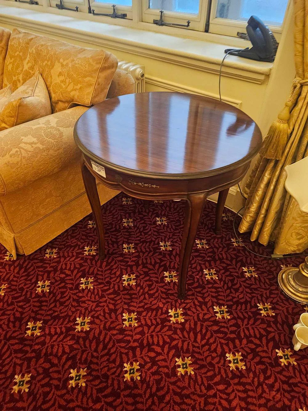Lot 339: GORDON'S Late 20th Century Spanish Style Round Mahogany Game Table