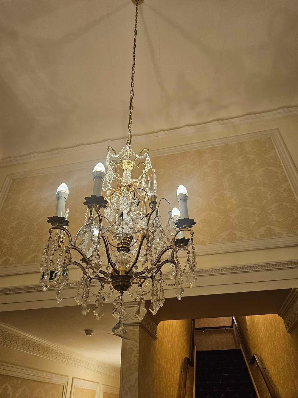 Lot 344: A French Louis XV Style Brass and Crystal Chandelier, Early 20th Century
