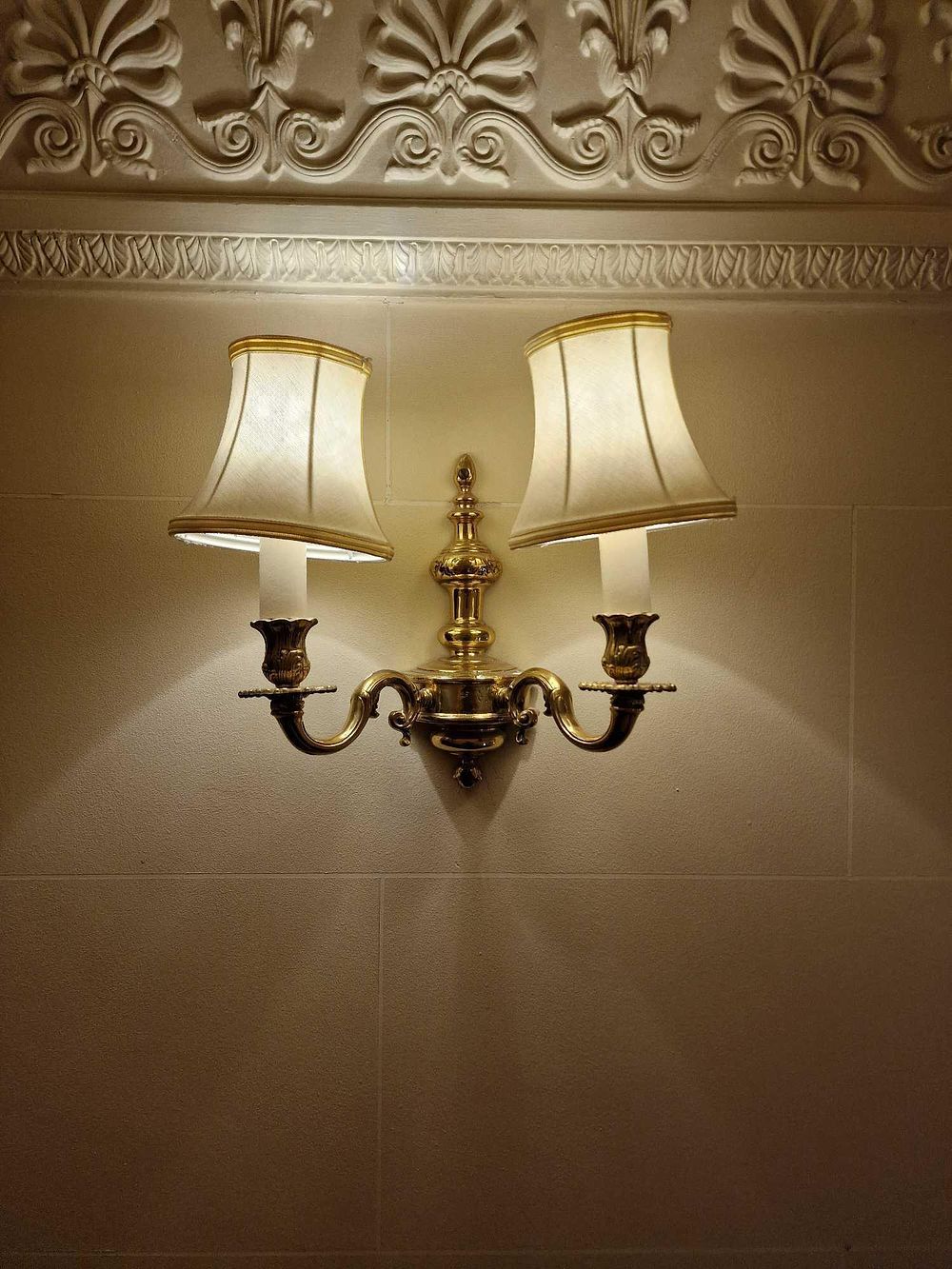 Lot 367: A Traditional Revival Brass Double-Arm Wall Sconce