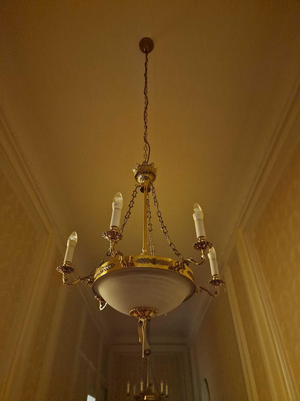 Lot 391: A French Empire Style Gilt Metal and Frosted Glass Four-Light Chandelier
