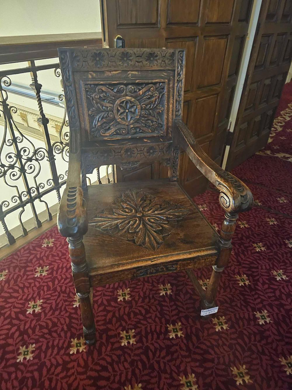 Lot 395: A Pair of Carved Oak Jacobean Revival Armchairs