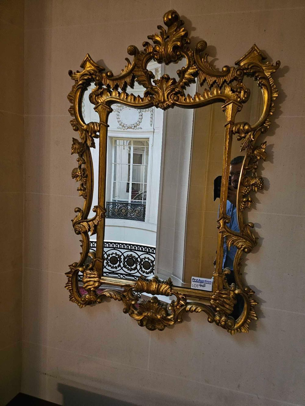 Lot 405: An 18th Century Rococo Style Giltwood Wall Mirror