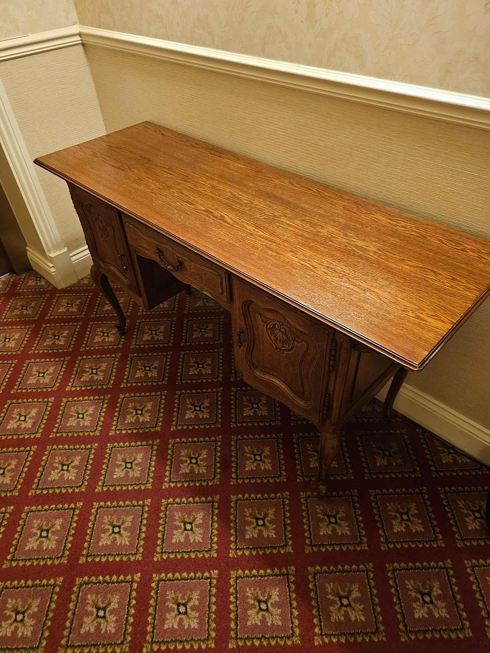 Lot 411: A French Louis XV Style Carved Oak Desk