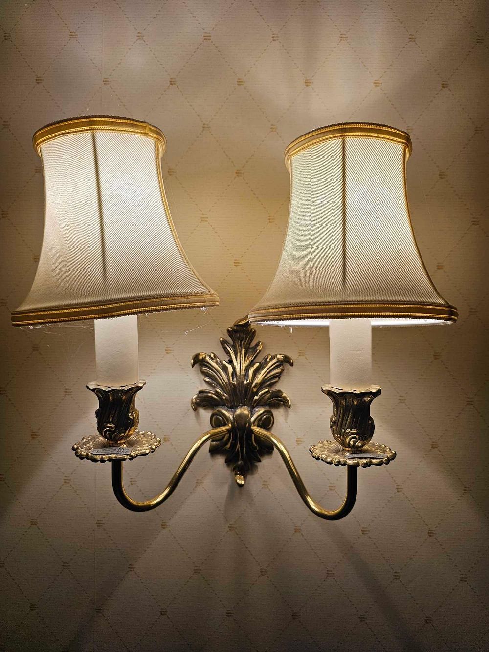 Lot 516: A Colonial Revival Style Double-Arm Brass Wall Sconce