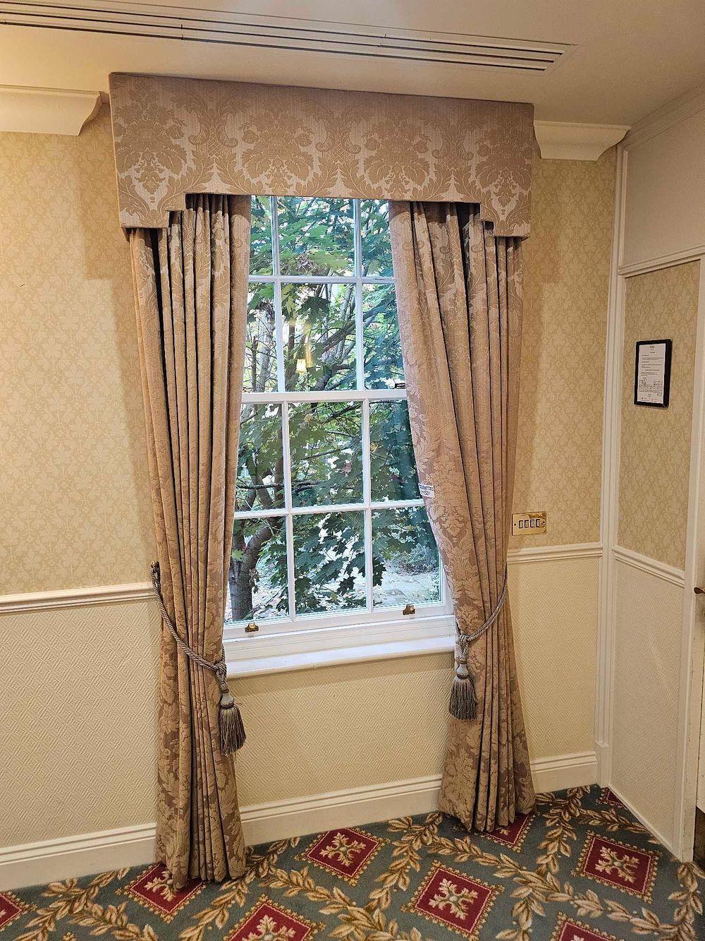 Lot 521: A Pair of Jacquard-Woven Damask Curtains with Shaped Pelmet and Rope Tie-Backs