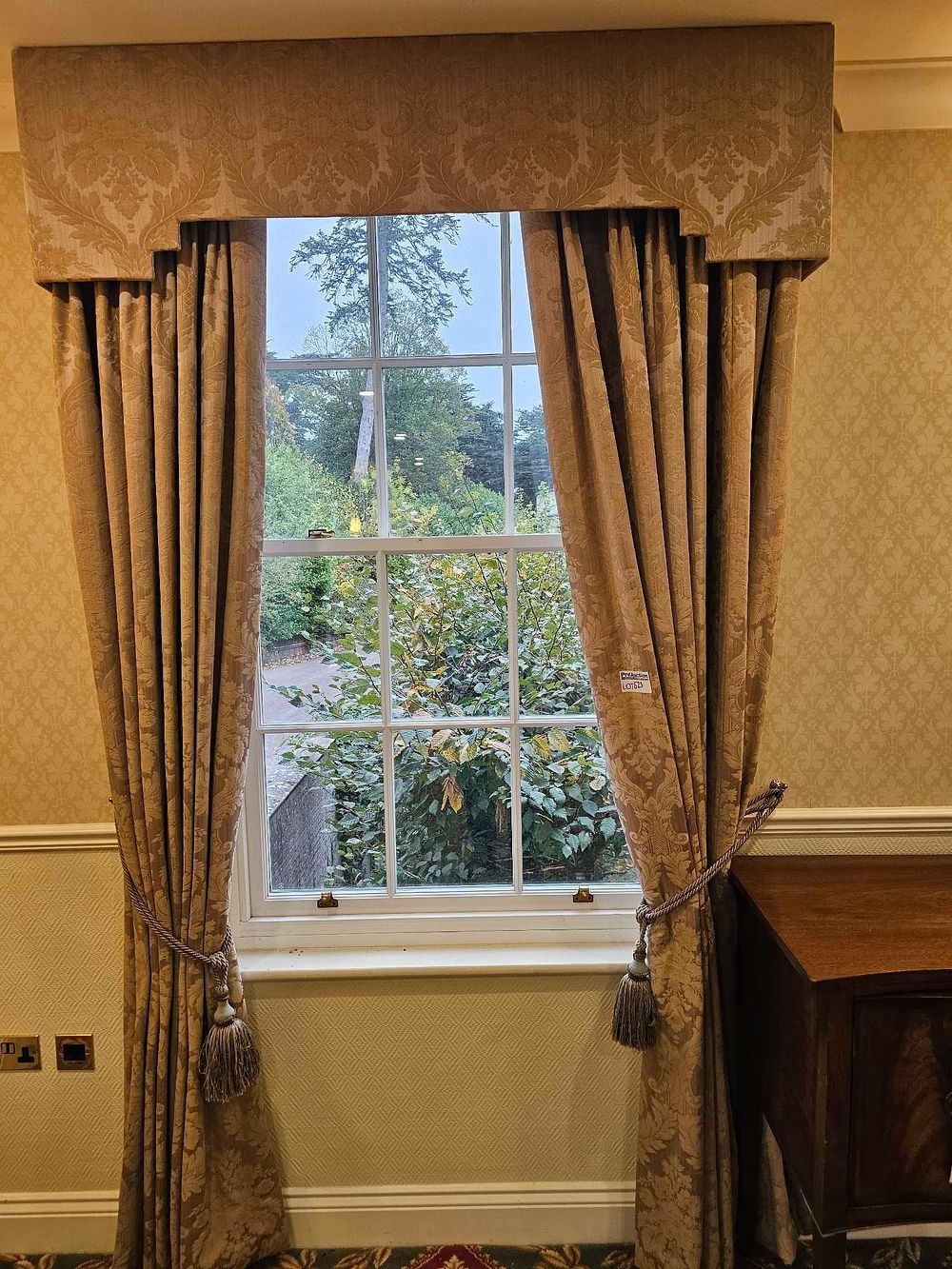 Lot 523: A Pair of Gold Jacquard Curtains with Valance and Tie-Backs