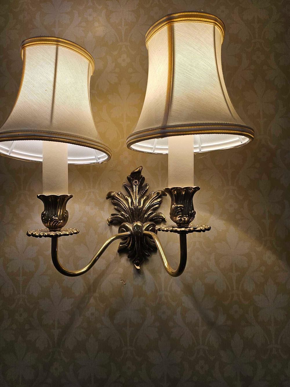 Lot 528: A Colonial Revival Double-Arm Brass Wall Sconce