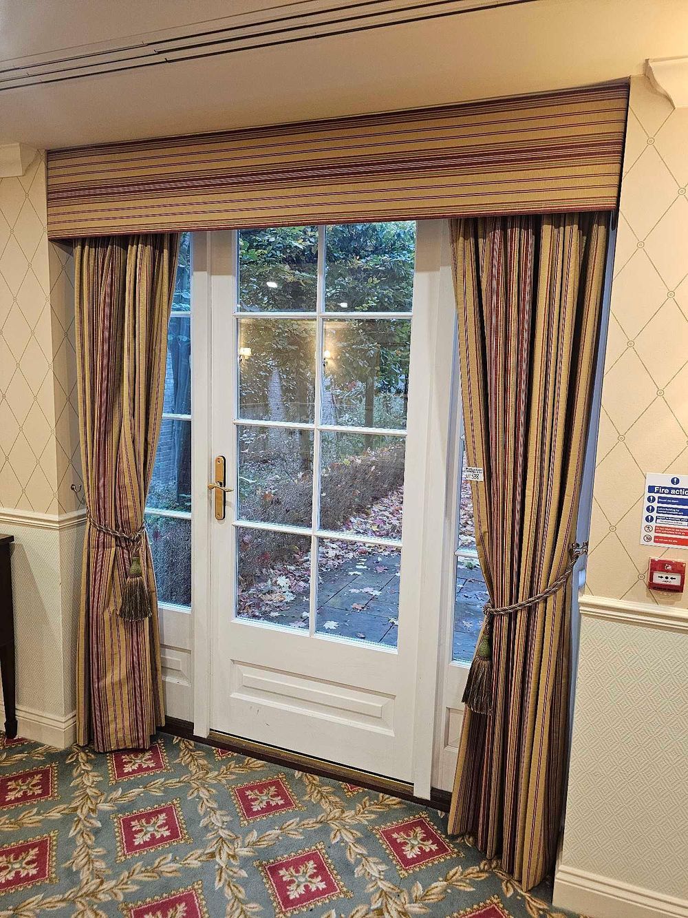 Lot 538: A Pair of Contemporary Striped Textile Curtains with Pelmet and Tie-Backs