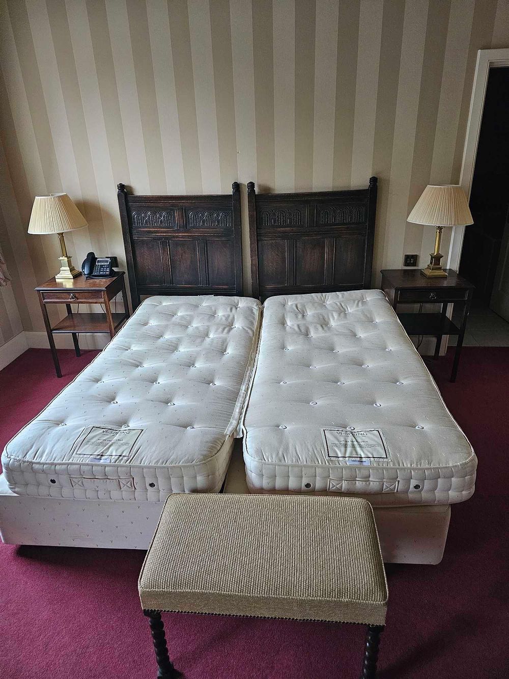 Lot 599: A Collection of Jacobean Revival Style Bedroom Furniture, including a Pair of VISPRING 'THE BARONESS' Single Mattresses and Divan Bases