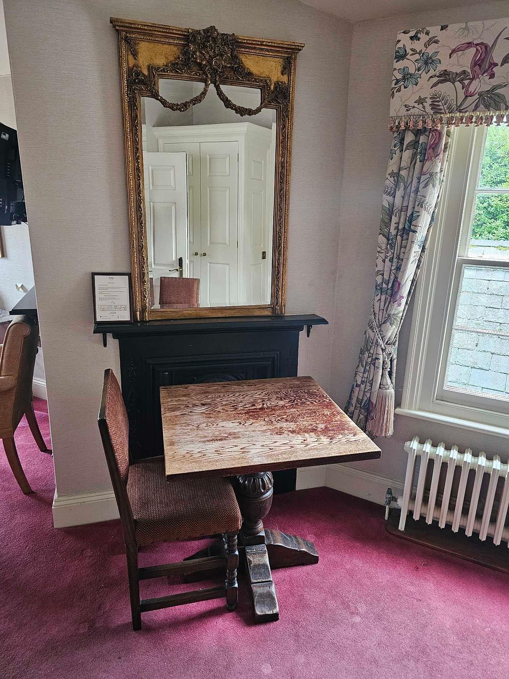 Lot 608: A Late 19th/Early 20th Century Jacobean Revival Style Carved Wooden Bistro Table and a Group of Associated Chairs