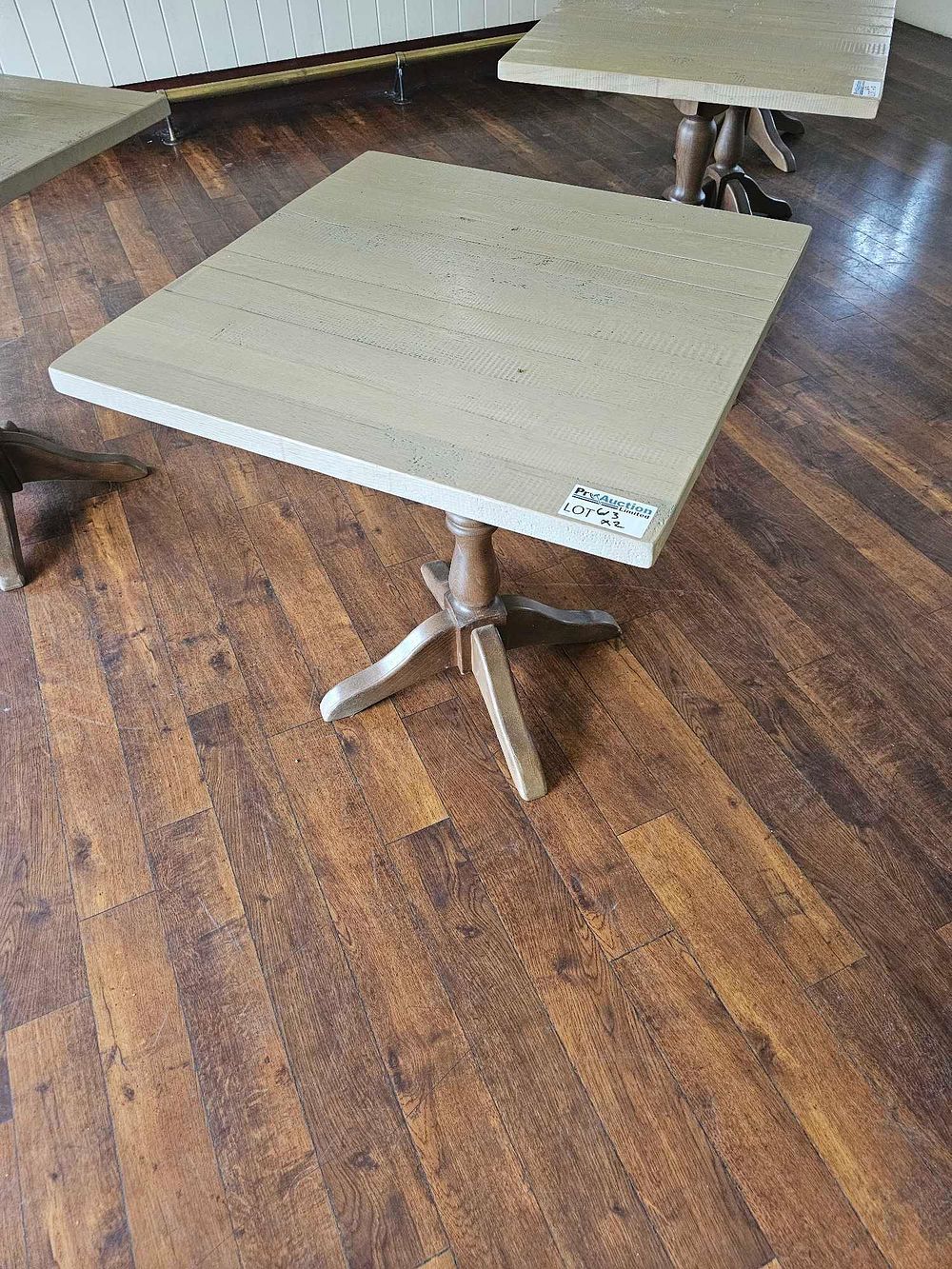 Lot 613: A Contemporary Cafe Pedestal Table with Planked Wood Top