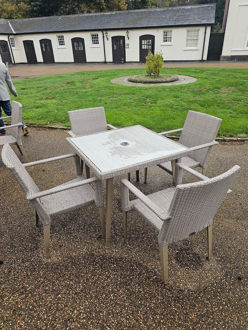 Lot 644: A Contemporary Five-Piece Outdoor Dining Set