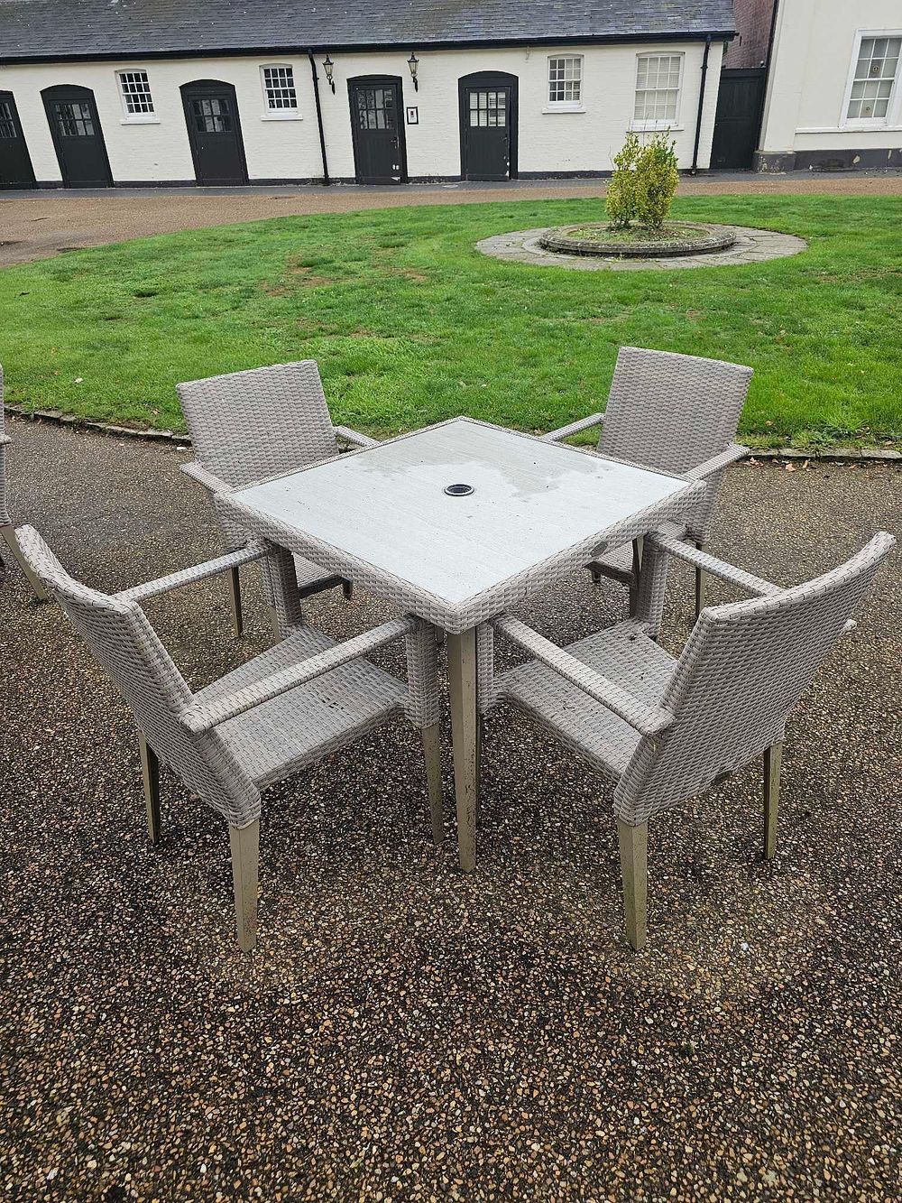 Lot 645: A Five-Piece Contemporary Outdoor Dining Set