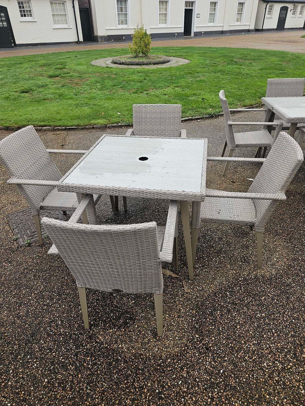 Lot 647: A Set of Five Contemporary Grey Synthetic Woven Outdoor Patio Dining Furniture