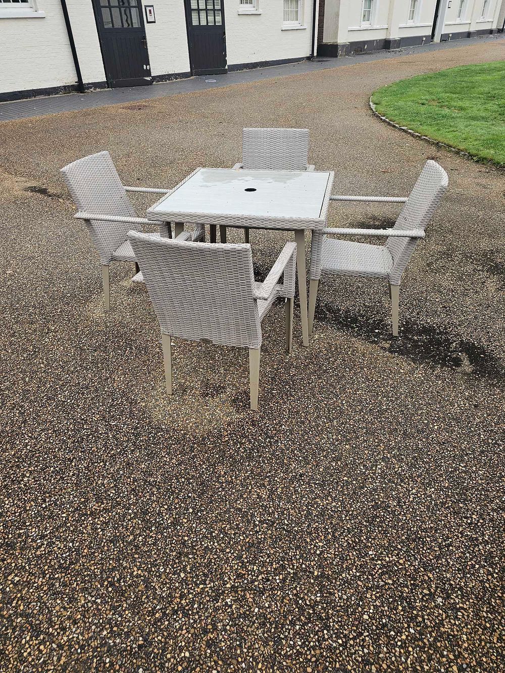 Lot 653: East West Furniture 5-Piece Outdoor Wicker and Aluminum Dining Set with Glass Top