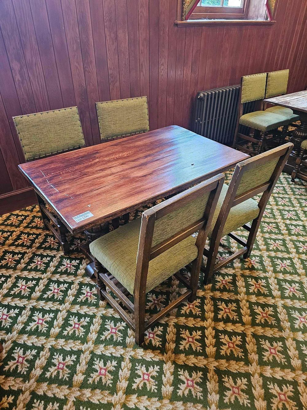 Lot 656: A Jacobean Revival Style Oak Refectory Dining Table and Set of Four Chairs
