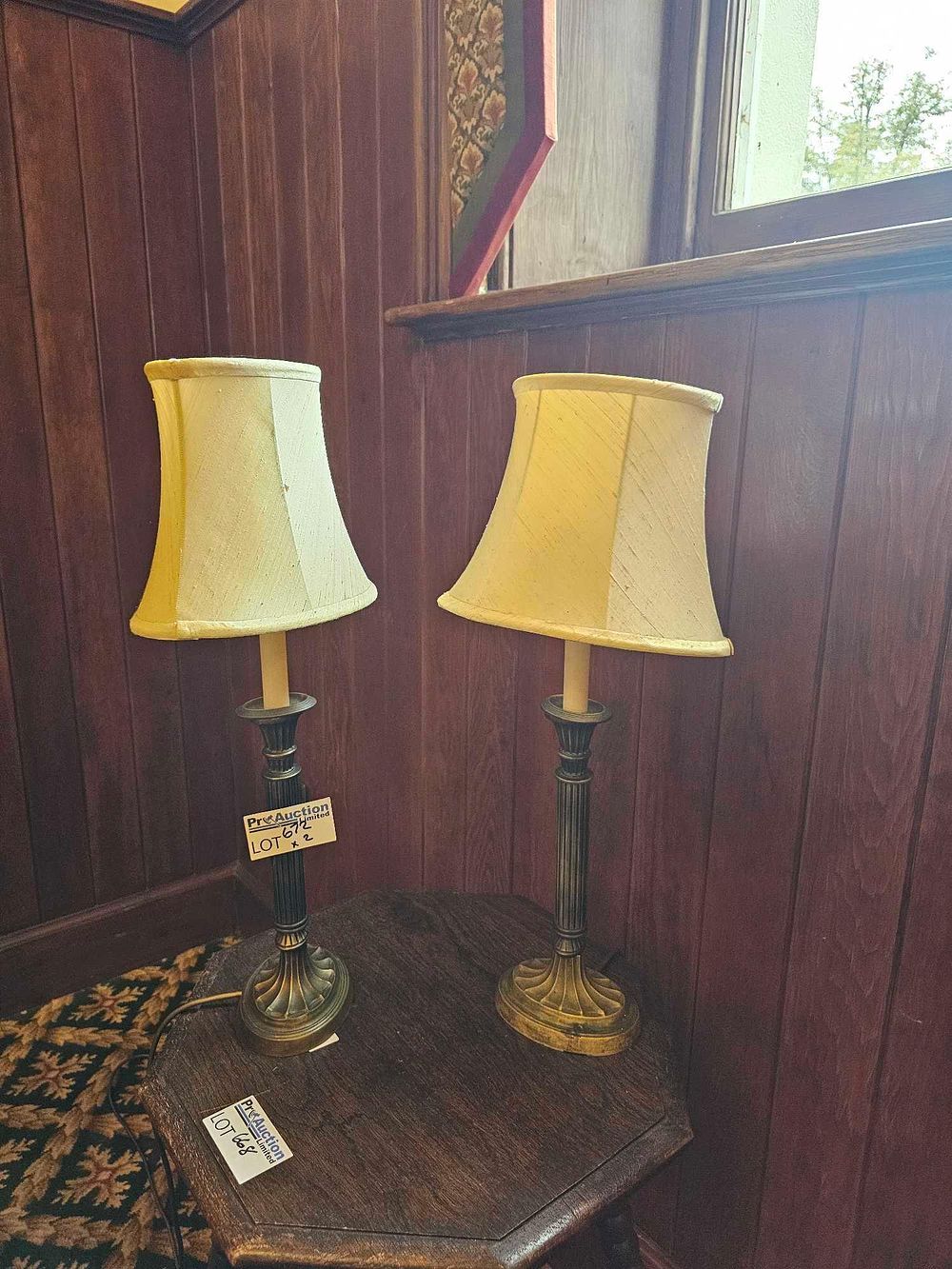 Lot 672: A Pair of Neoclassical Style Cast Metal Column Table Lamps