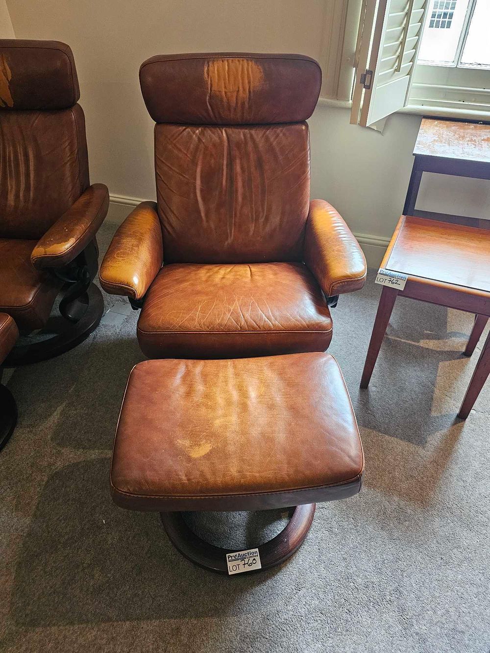 Lot 760: Ekornes Stressless Leather Recliner Armchair and Ottoman