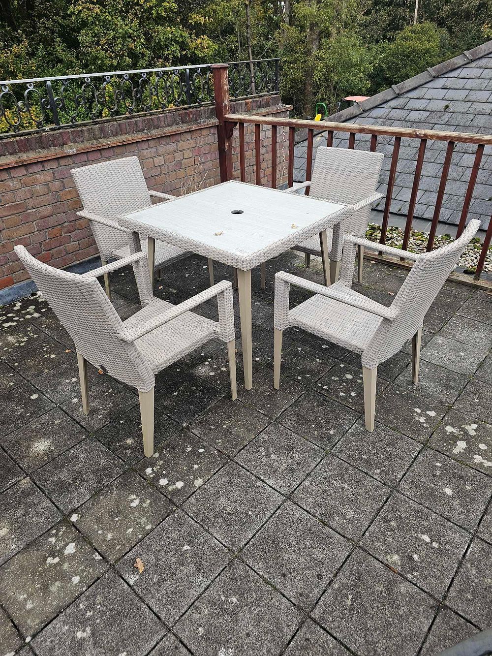 Lot 771: A Set of Five Contemporary Outdoor Patio Furniture, comprising a Square Table and Four Armchairs