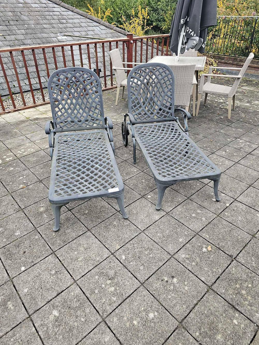 Lot 773: A Pair of Late 20th Century Cast Aluminum Outdoor Chaise Lounges