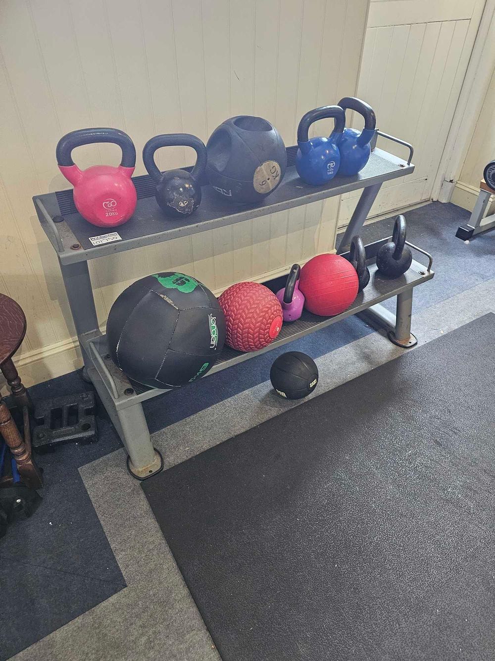 Lot 790: A Collection of Modern Fitness Equipment on a Two-Tier Utility Rack