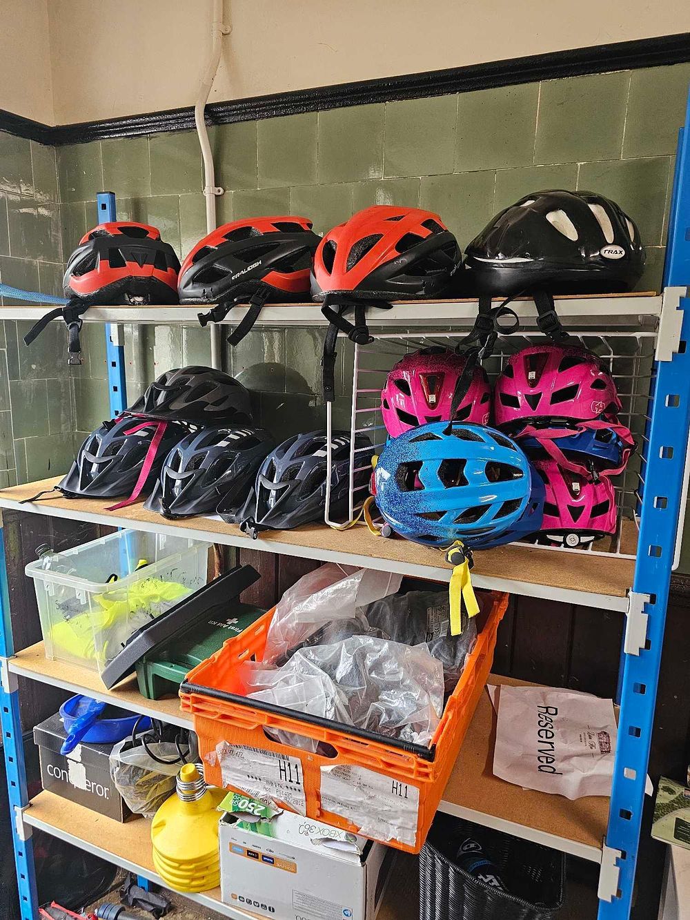 Lot 822: A Collection of Contemporary Bicycle Helmets, including Raleigh and Trax Examples